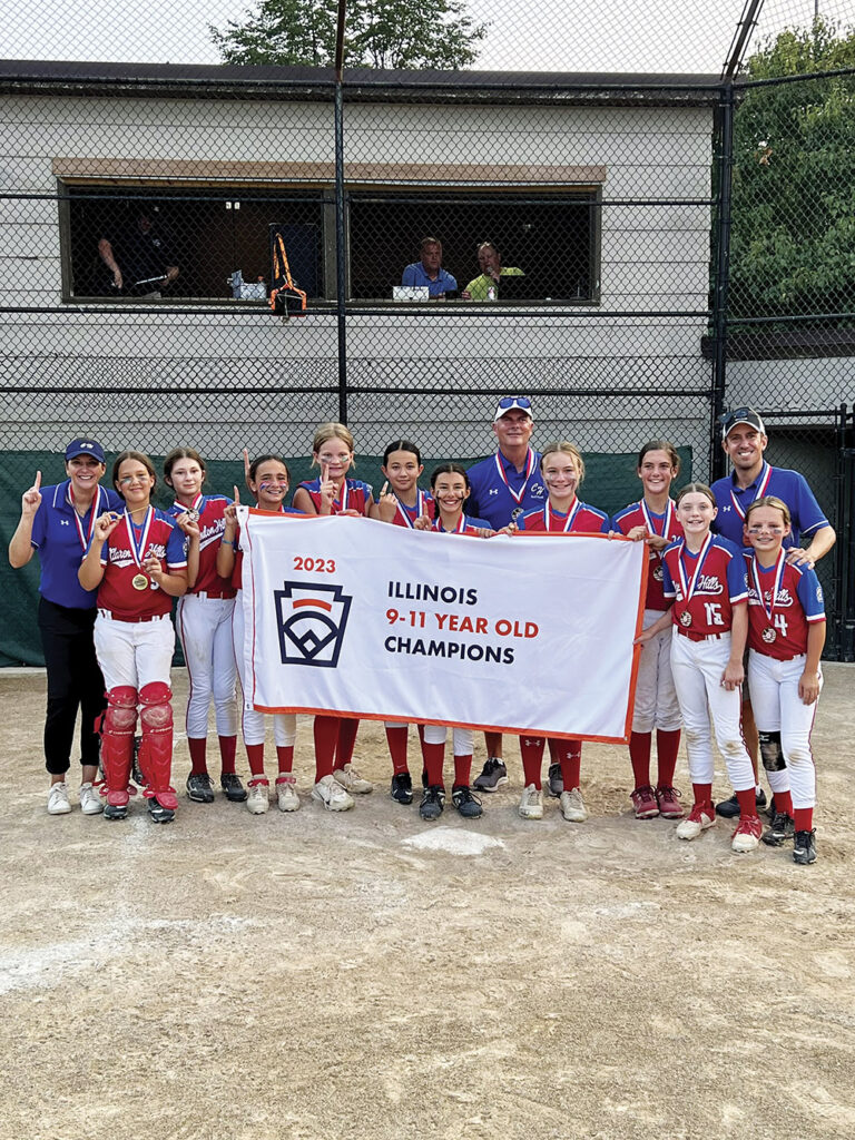 The Clarendon Hills Little League Softball 11 and Under State Championship Team: Coach Michelle Speziale, 
Grayson Contreras, Gia Sikorski, Despina Patos, Anna Makstenieks, Olivia McEwen, Emme Campos, Coach Jason Havens, 
Abby Przyzycki, Emmy Havens, Ellie Brankin, Coach Rob Goeckel, Charlotte Goeckel. Photo courtesy of Clarendon Hills Little League