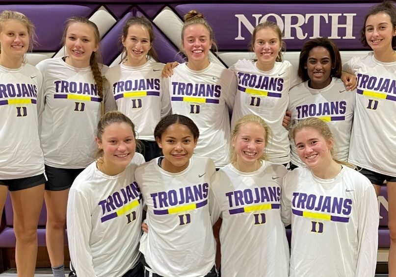 Among the Trojans teammates pictured, Ryann Wendt (far left), Violet Mitchell (third from left), Maggie Fleming (
fourth from left), and Kate Gross (fifth from left) shared both friendship and success on the court.