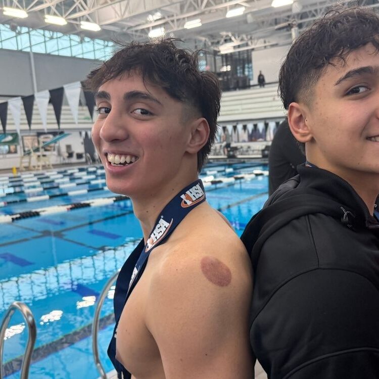 Luke Vatev (left) and his brother Matthew won back-to-back state championships at the IHSA state meet in late February.