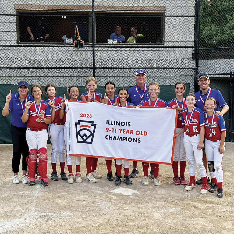 The Clarendon Hills Little League Softball 11 and Under State Championship Team: Coach Michelle Speziale, 
Grayson Contreras, Gia Sikorski, Despina Patos, Anna Makstenieks, Olivia McEwen, Emme Campos, Coach Jason Havens, 
Abby Przyzycki, Emmy Havens, Ellie Brankin, Coach Rob Goeckel, Charlotte Goeckel. Photo courtesy of Clarendon Hills Little League